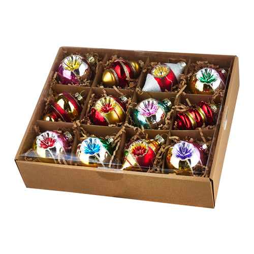 A box of 12 assorted colorful Christmas ornaments displayed in a brown box.