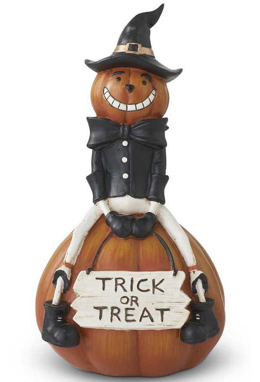 Halloween-themed pumpkin figurine with a witch costume holding a 'Trick or Treat' sign.