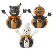 Three Halloween-themed pumpkin figurines on a white background