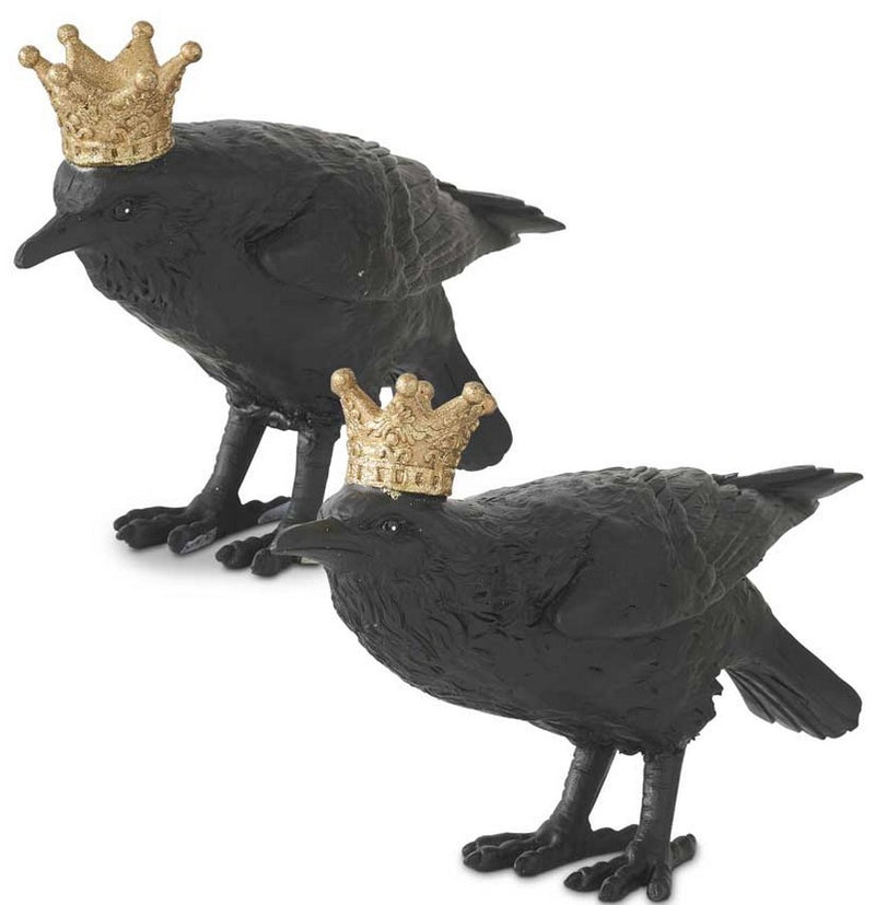 Two black resin crows with gold crowns on their heads, designed as decorative figurines.
