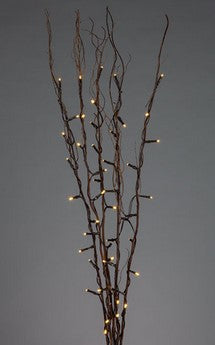 Decorative branch with lights against a gray background