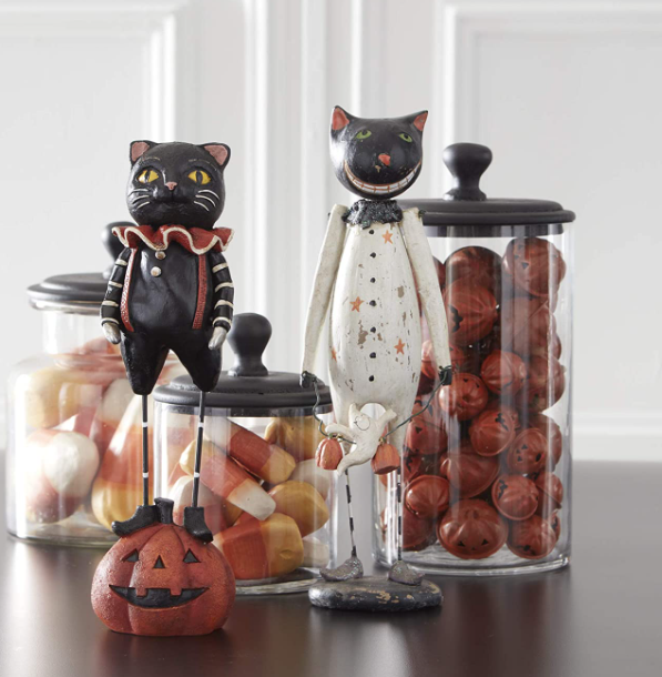 Black Cat with Metal Legs Standing and Fabric Shorts
