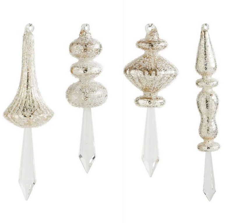 Set of four decorative Christmas ornaments with crystal prisms on a white background