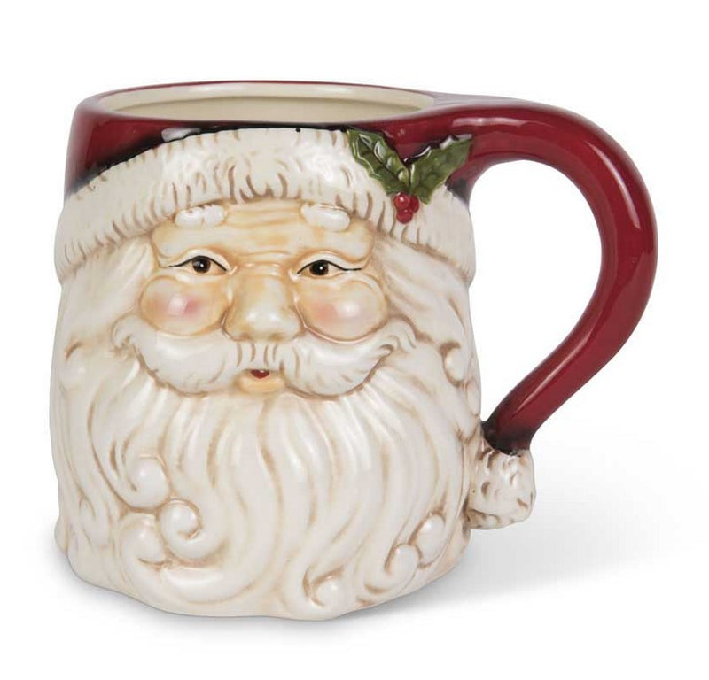 Ceramic mug shaped like a face with a beard and red handle on a white background
