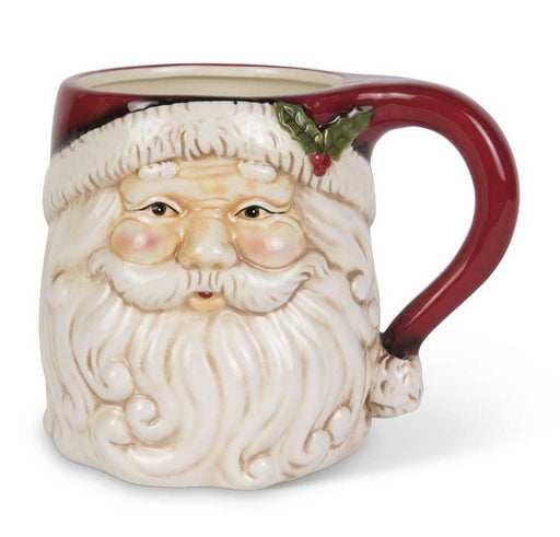 Ceramic mug shaped like a face with a beard and red handle on a white background