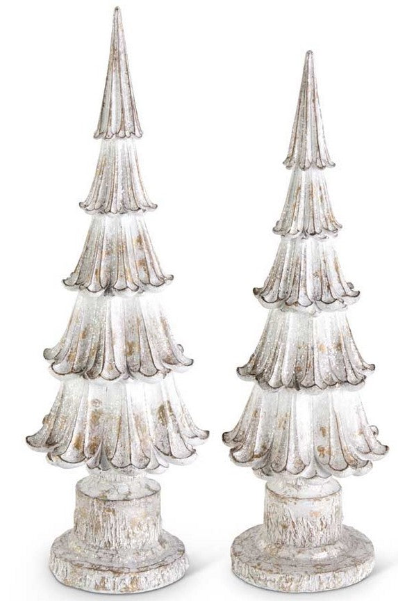 Two decorative Christmas trees with a distressed white finish on a white background