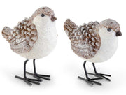 Two decorative bird figurines with a frosty texture on a white background