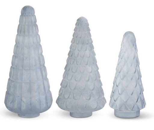 Three textured glass Christmas tree figurines on a white background