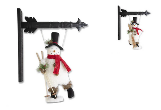 Two decorative snowmen with skis and top hats hanging from black arrows on a white background.