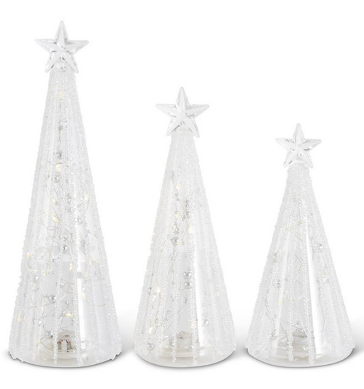 Three white Christmas trees with star decorations on a white background