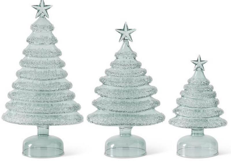 Three decorative Christmas trees with star toppers on a white background