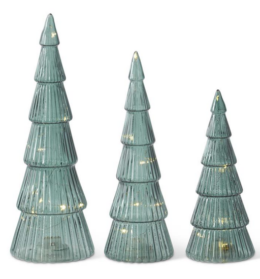 Set of three green ceramic Christmas trees with LED lights on a white background