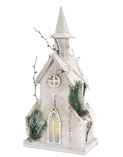 Decorative white church model with Christmas elements on a white background
