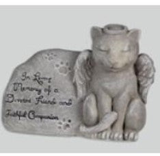 Statue of a cat with angel wings and a plaque on a white background
