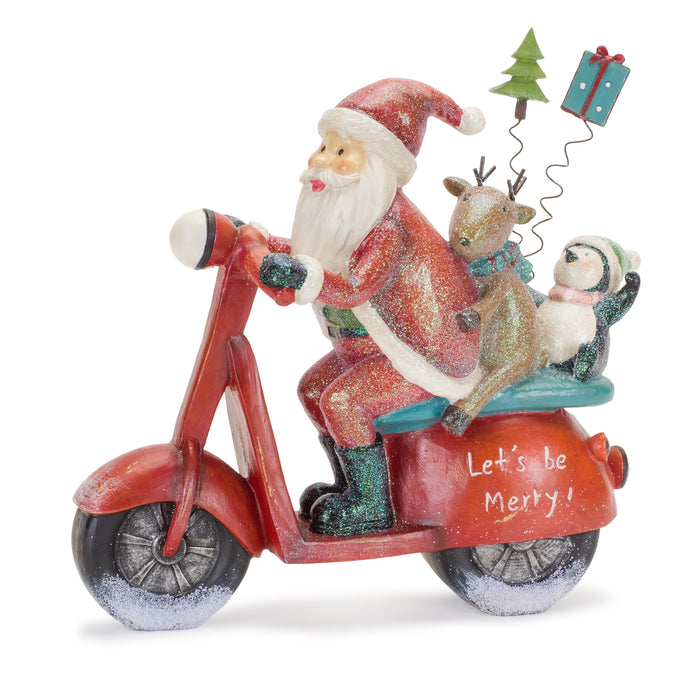 Santa on Scooter Figurine