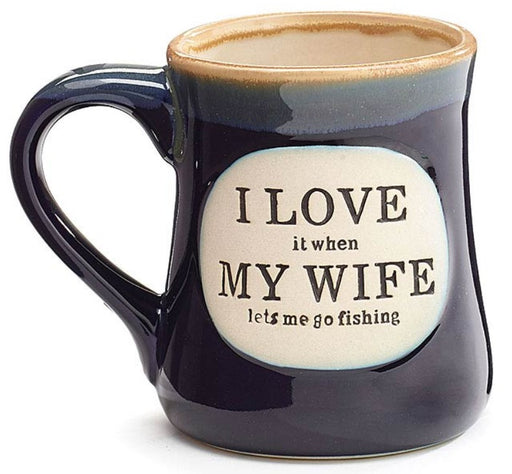 Blue mug with text 'I love it when my wife lets me go fishing' on a white background