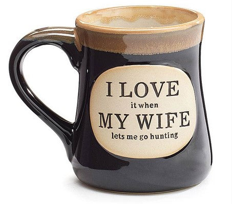Black mug with a humorous inscription on a white background
