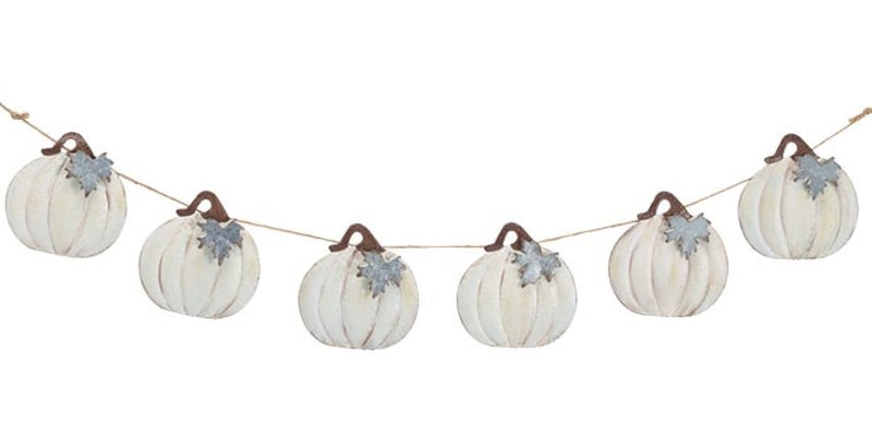 Decorative string with white pumpkins and brown stems on a white background