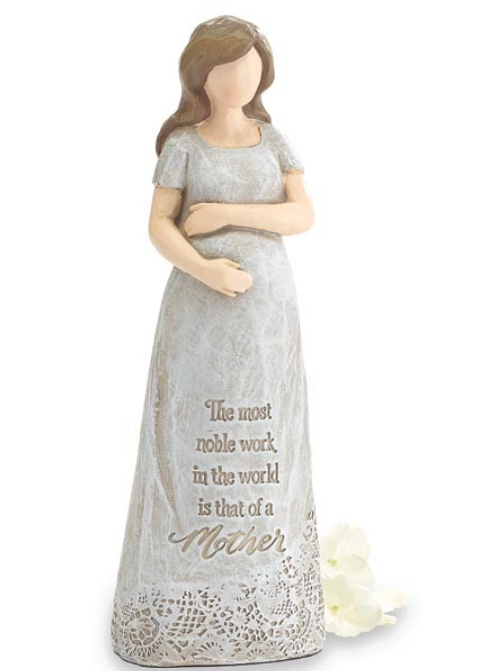 Statue of a pregnant woman in a flowing dress with engraved text on a white background