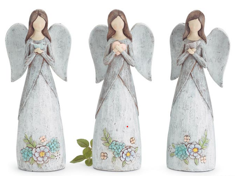 Three angel figurines with floral designs on a white background