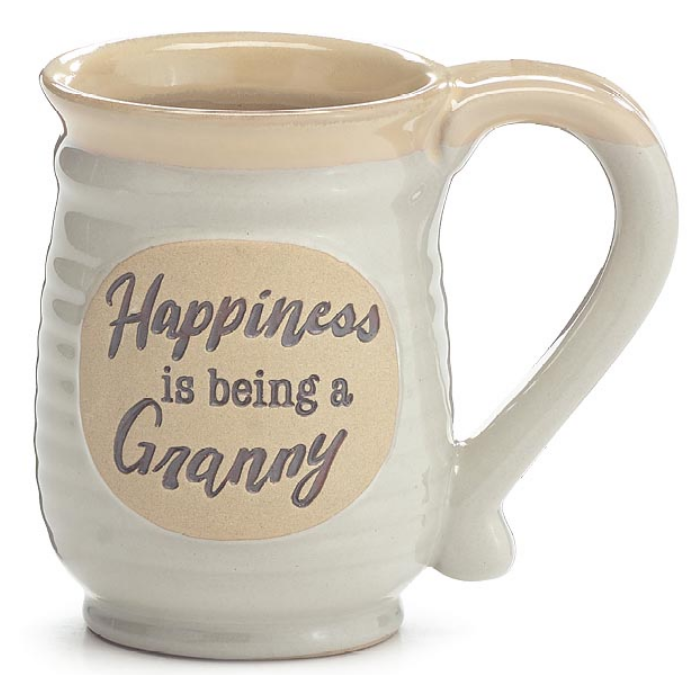White mug with 'Happiness is being a Granny' text on a beige label