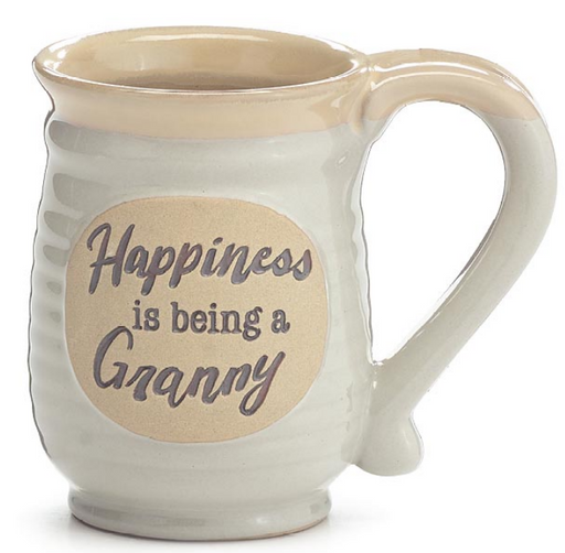White mug with 'Happiness is being a Granny' text on a beige label