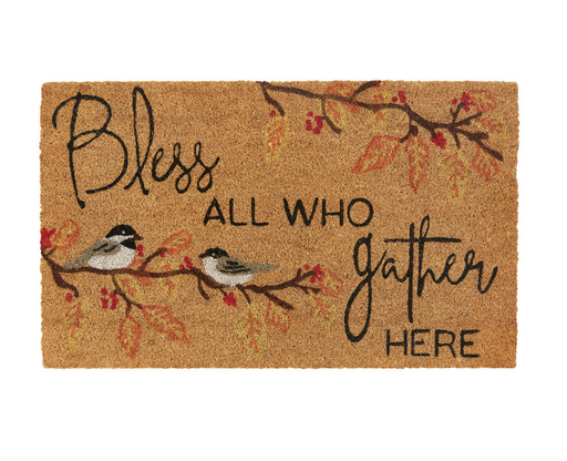 Doormat with birds and text 'Bless all who gather here' on a white background