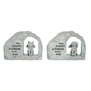 Two stone memorials with dog figurines and engraved text on a white background
