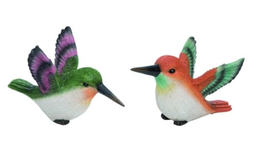 Two colorful bird figurines on a white background
