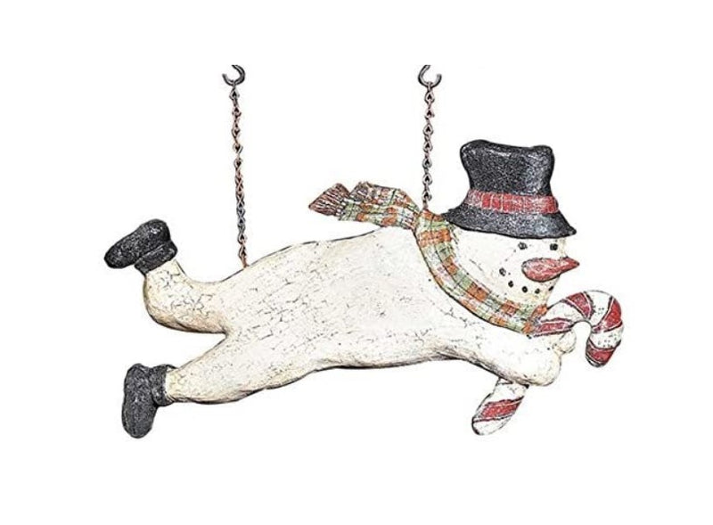 Decorative snowman ornament with top hat and scarf, hanging on a white background