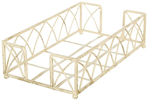 Decorative metal basket with geometric design on a white background