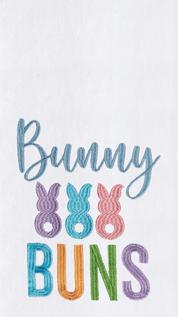 Embroidered text 'Bunny Buns' with colorful bunny illustrations on a white background