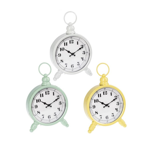 Three clock-shaped keychains in white, green, and yellow on a white background