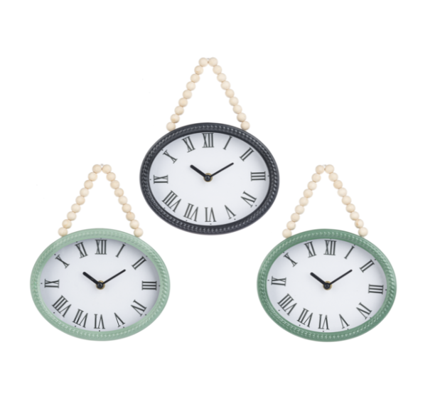 Three wall clocks with Roman numeral markings on a white background