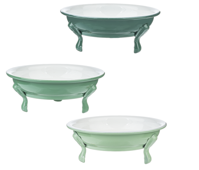 Three green ceramic bowls with white interior on a white background