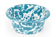 A blue and white marbled enamelware ramekin on a white background.