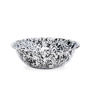 A medium-sized round enamel basin with a black and white marbled pattern.
