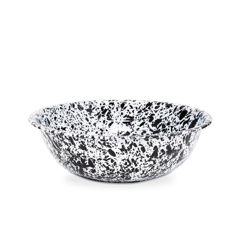 A medium-sized round enamel basin with a black and white marbled pattern.