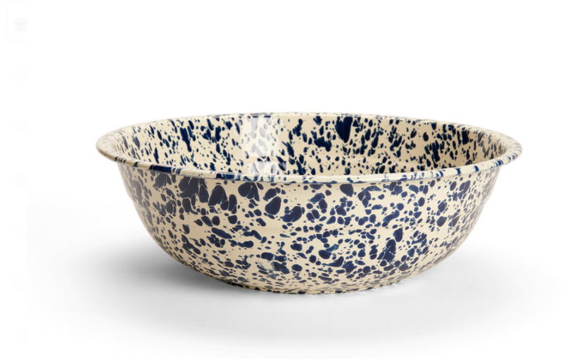 A medium-sized round enamel basin with a blue and white marbled pattern.