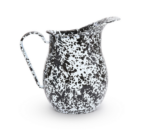 A black and white splatter pattern enamel pitcher