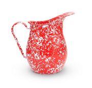 A red and white splatter pattern enamel pitcher