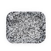 Speckled black and white rectangular tray on a white background