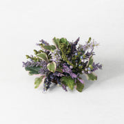Bouquet of flowers with green leaves and purple flowers on a white background