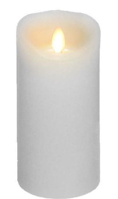 White candle with a lit flame on a white background