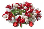 Decorative wreath with red, white, and green beads on a white background