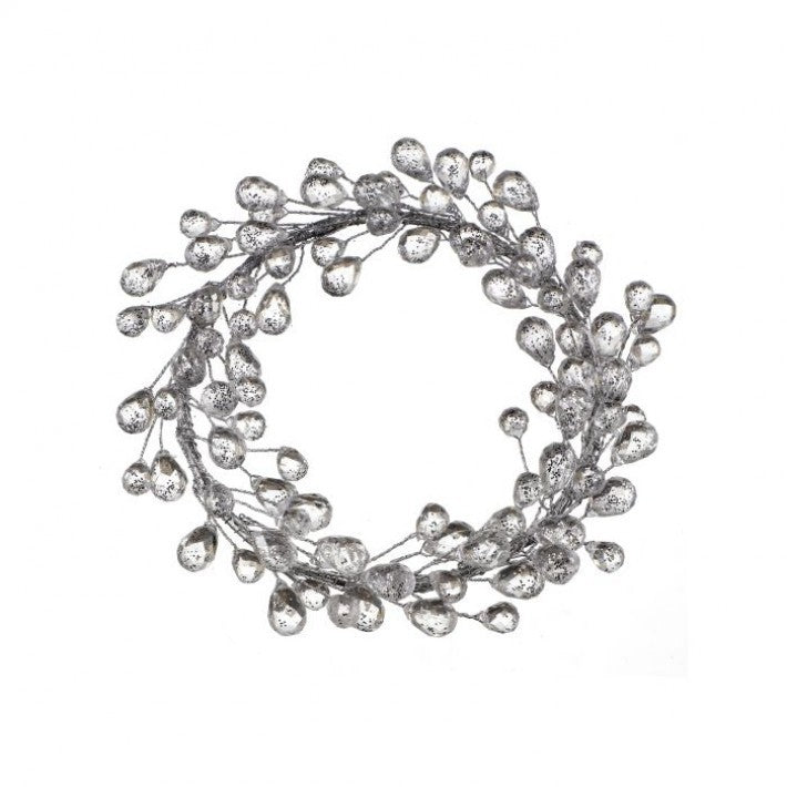 Decorative wreath with crystal-like beads on a white background