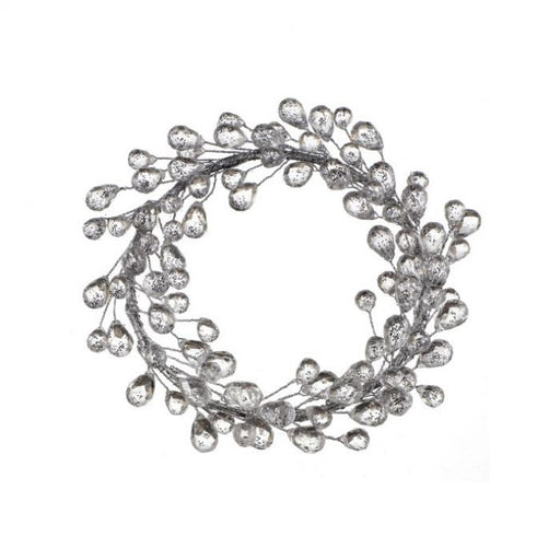 Decorative wreath with crystal-like beads on a white background