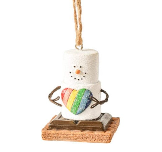 Decorative ornament shaped like a marshmallow snowman holding a rainbow heart.