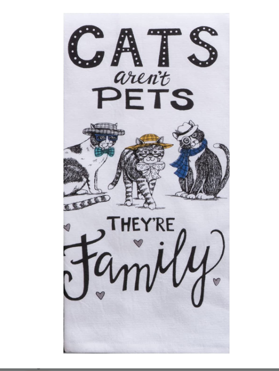 Towel with cartoon cats and text 'Cats aren't pets, they're family' on a white background