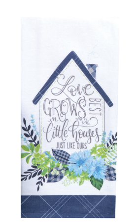 Decorative towel with house design, floral elements, and text on a white background